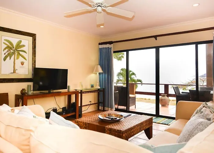 Elegant 3br Beachfront With Spacious Interior, Ocean-view Terrace & Direct Access To Playa Flamingo