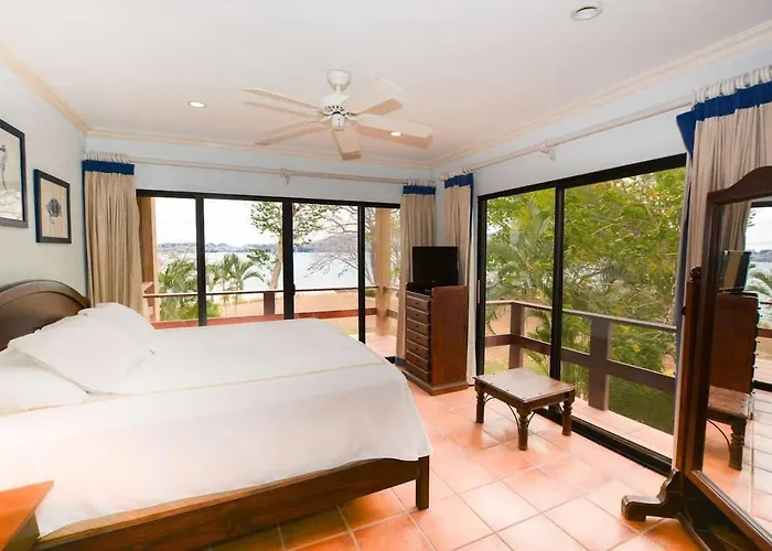Elegant 3br Beachfront With Spacious Interior, Ocean-view Terrace & Direct Access To * Playa Flamingo